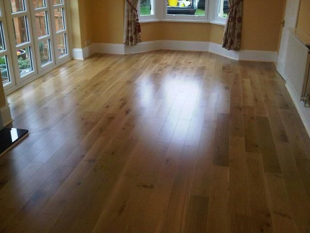 Engineered oak flooring, fitted and finished
