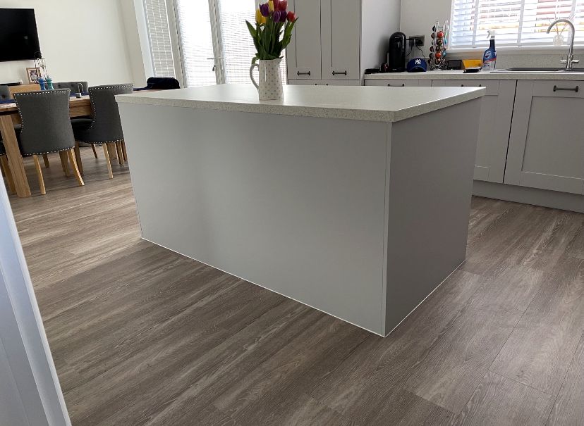 Light grey shaker kitchen with central island